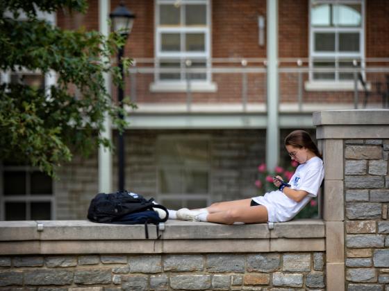 student on phone